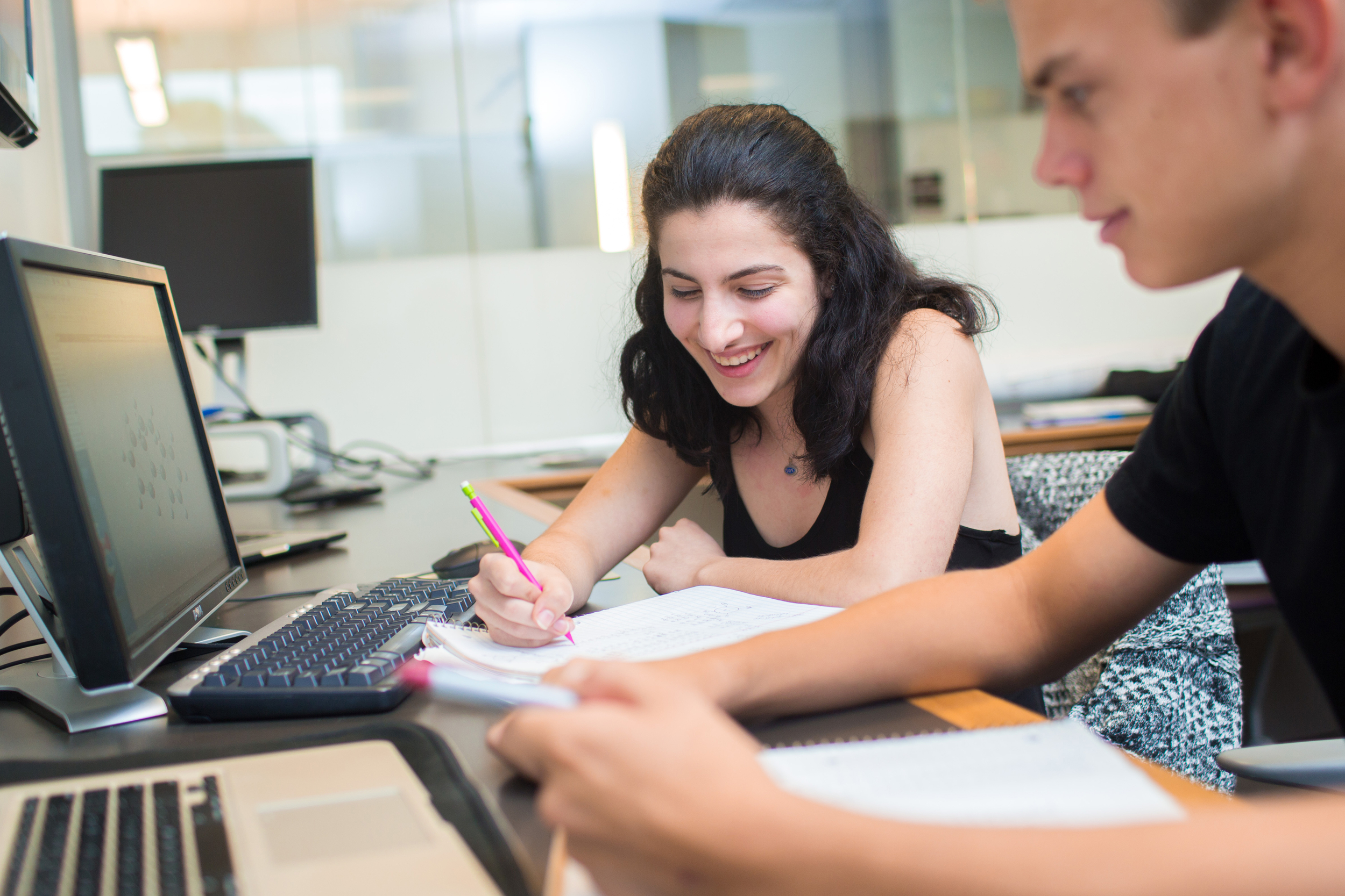 Trinity students working on an assignment