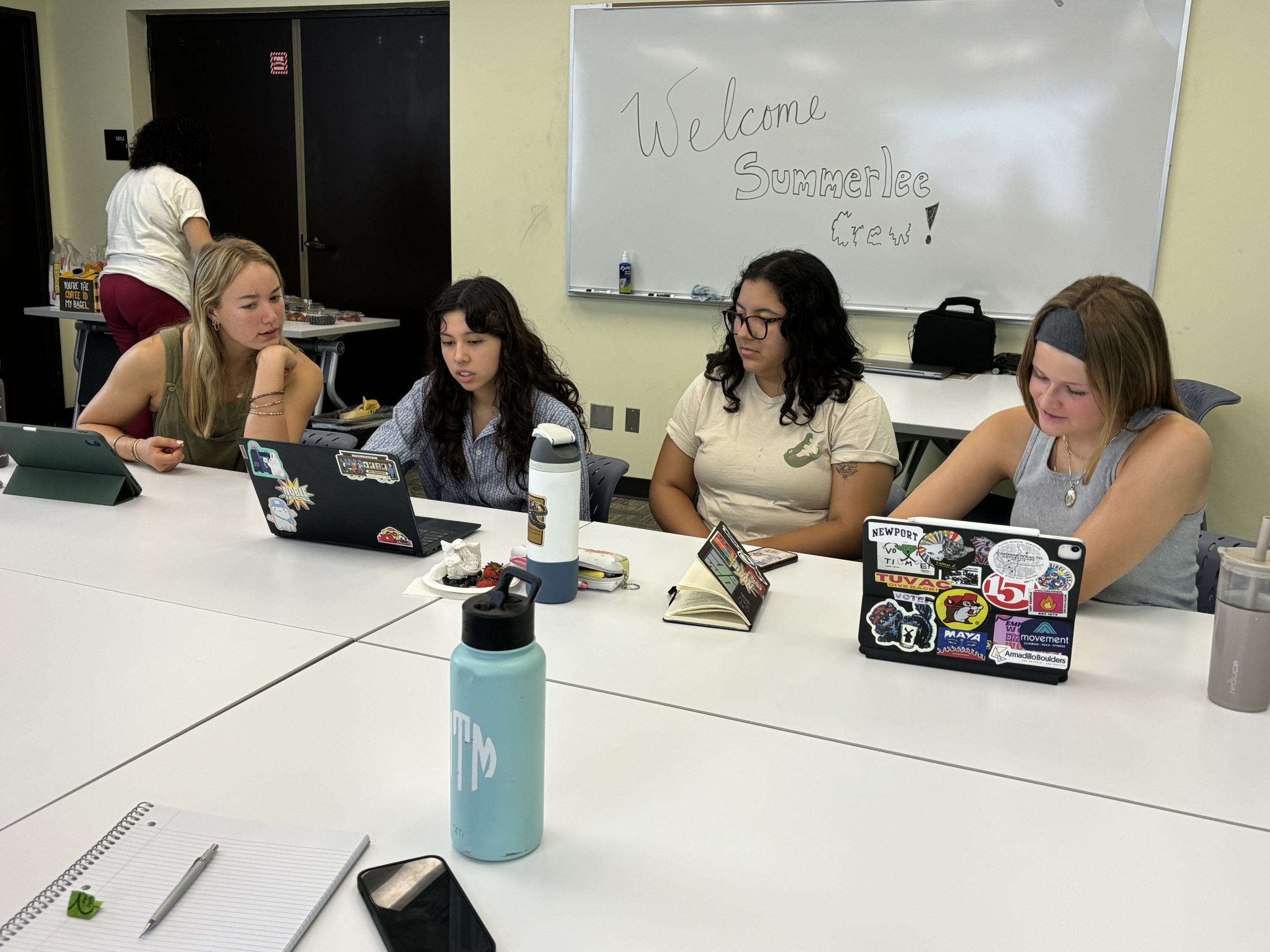 Students practice with oral history recording equipment.